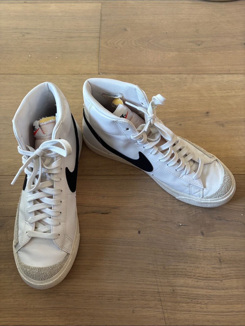 Nike White High-Top Sneakers with Black Swoosh Accents 10.5